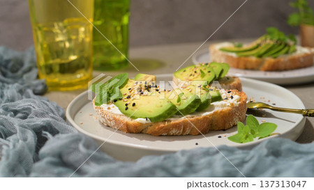 Toast with avocado cream cheese and wheat bread 137313047