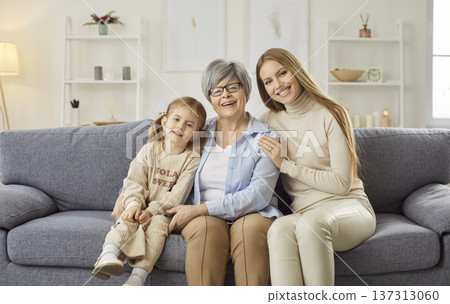 Kind loving three generations, affectionate young granddaughter and elderly grandma close hug 137313060