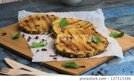 Grilled pineapple slices Grilled pineapple slices 137313386