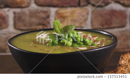 Green pea soup with seeds 137313451