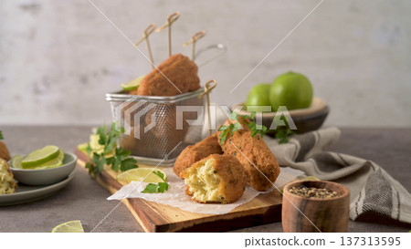 Cod dumplings or bolinhos de bacalhau 137313595