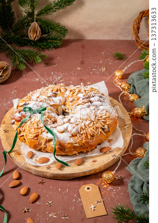Bolo Rainha, a festive ring cake adorned with almonds and powdered sugar Bolo Rainha, a festive ring cake adorned with almonds and powdered sugar 137313633