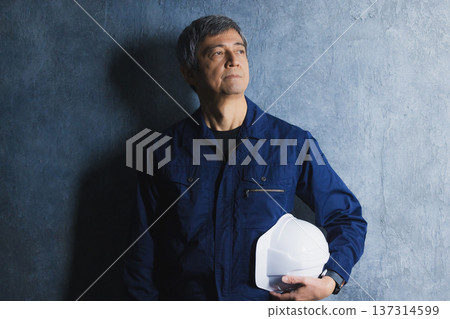 Senior man in work clothes 137314599