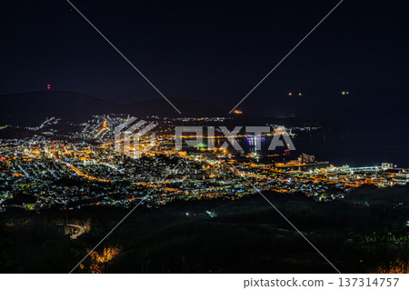 Beautiful night view of the port town of Otaru, Hokkaido, and scenery of Otaru Port Beautiful night view of the port town of Otaru, Hokkaido, and scenery of Otaru Port 137314757