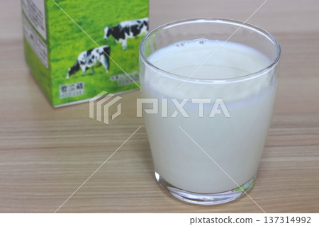 Milk in a glass and a milk carton Milk in a glass and a milk carton 137314992