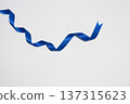 Blue ribbon on white background 137315623