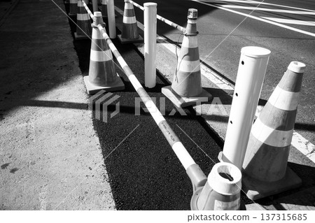 Road construction to improve sidewalks, monochrome 137315685