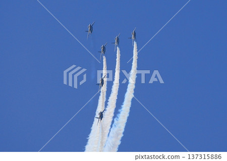 Blue Impulse flying in the blue sky 137315886