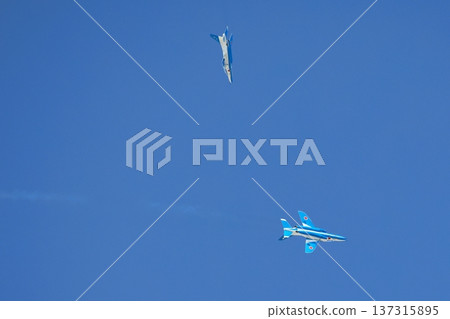 Blue Impulse flying in the blue sky Blue Impulse flying in the blue sky 137315895