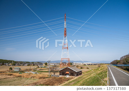 Steel tower standing in a rice field, Kyotanabe City, Kyoto Prefecture 137317380