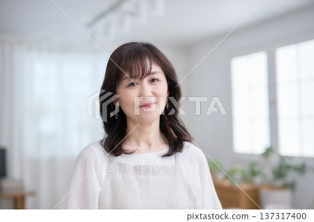 A lovely middle-aged woman with a smile 137317400