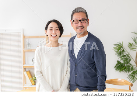 A couple cuddling with a smile 137320128