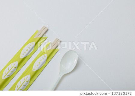 Image of spoon and chopsticks on white background 137320172