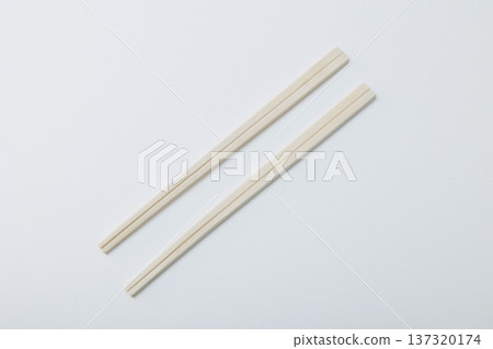 Disposable chopsticks on white background 137320174