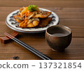 Sake in a small cup and Nanbanzuke mackerel 137321854