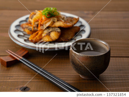 Sake in a small cup and Nanbanzuke mackerel 137321854