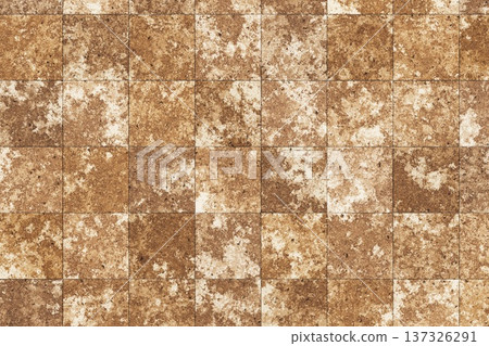 Rustic brown stone tiles texture with weathered aged effect for architectural background design Rustic brown stone tiles texture with weathered aged effect for architectural background design 137326291