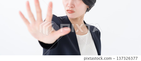 Businesswoman stopping with her hand Businesswoman stopping with her hand 137326377