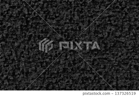 Black charcoal rock texture with sharp jagged edges for dark dramatic background and 3D material. 137326519