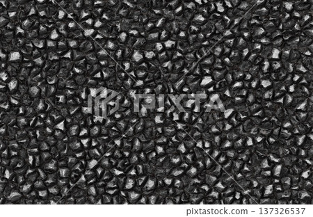 Shiny black coal texture background with small glossy rock fragments and mineral surface. 137326537