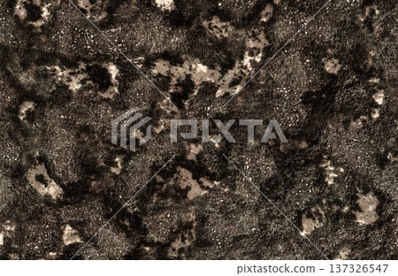 Dark black and brown rough grunge dirt or charred rock texture. Dark black and brown rough grunge dirt or charred rock texture. 137326547