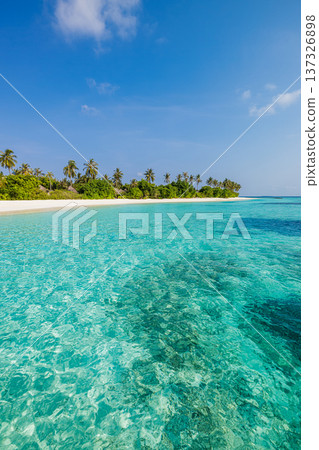 Majestic tropical beach with amazing ocean water for dream destination travel background in pristine paradise. Perfect vertical wallpaper 137326898