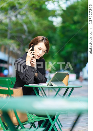 A woman in a suit with a negative expression A woman in a suit with a negative expression 137327266