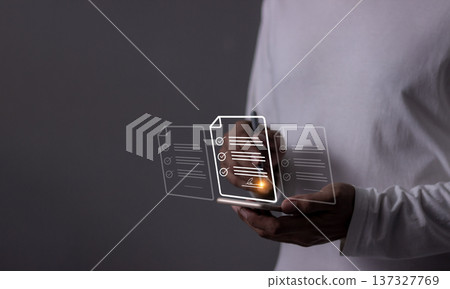 Young man with smartphone mobile hand touching to sign a Online Business Contract, Electronic signature, Contract signing, Digital documents, Future smart contract Young man with smartphone mobile hand touching to sign a Online Business Contract, Electronic signature, Contract signing, Digital documents, Future smart contract 137327769