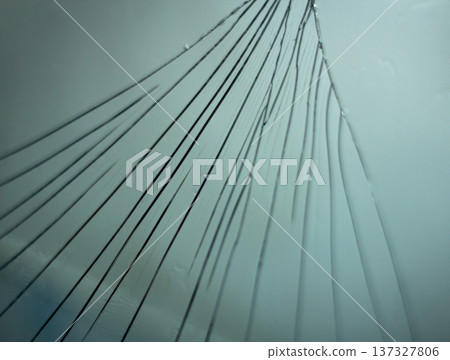 Cracked mirror symbolizing broken identity and emotional damage.Single teardrop on glass symbolizing emotional pain and sorrow. Cracked mirror symbolizing broken identity and emotional damage.Single teardrop on glass symbolizing emotional pain and sorrow. 137327806