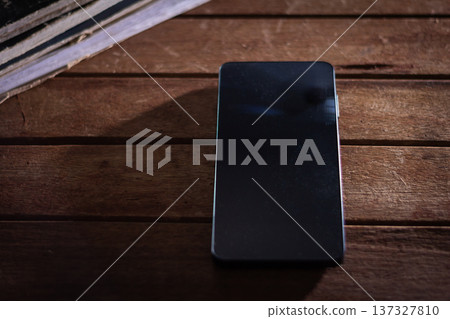 Silent phone showing loneliness and lack of communication. Silent phone showing loneliness and lack of communication. 137327810