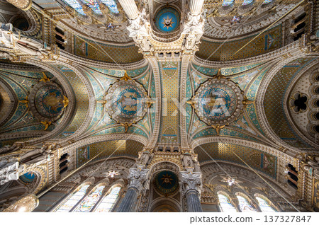 Lyon, france. December 27,2023. Ornate ceiling of the basilica of notre dame de fourviere in lyon, france, featuring intricate mosaics, frescoes, and gold accents 137327847