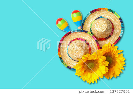 Cinco de Mayo, Two sombreros and bright sunflowers ready for a party Cinco de Mayo, Two sombreros and bright sunflowers ready for a party 137327991