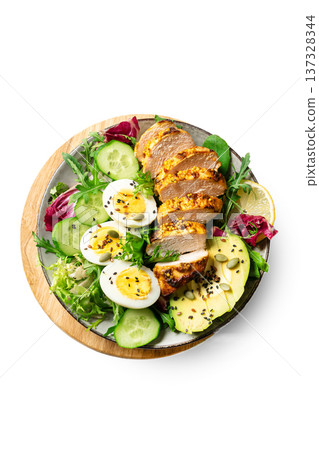 High protein lunch bowl with chicken, eggs and vegetables 137328344