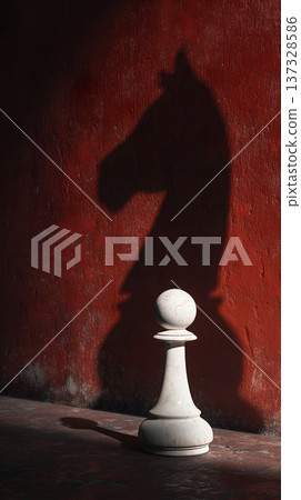 White chess piece stands before shadowy horse silhouette. Red textured wall casts dramatic, dark outline. Strong light highlights piece and its shadow. Minimalist composition conveys strategy 137328586