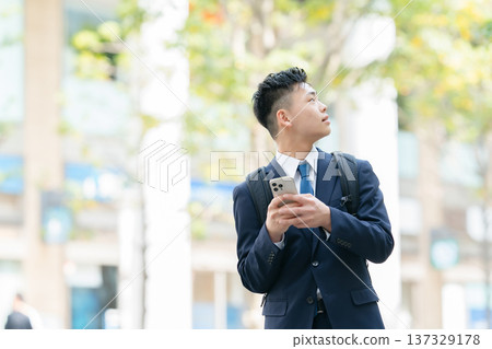 Young male business smartphone 137329178