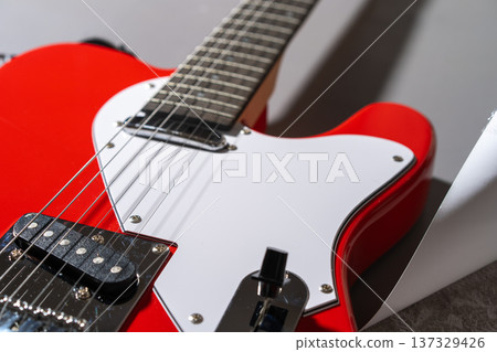 Electric Guitar Body Close-Up on gray background Electric Guitar Body Close-Up on gray background 137329426