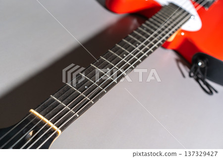 Red Guitar Neck Close-Up Red Guitar Neck Close-Up 137329427