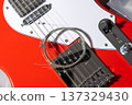 Red Guitar with Strings 137329430