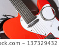Red Electric Guitar with Strings 137329432