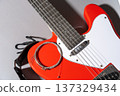 Red Electric Guitar with Strings 137329434