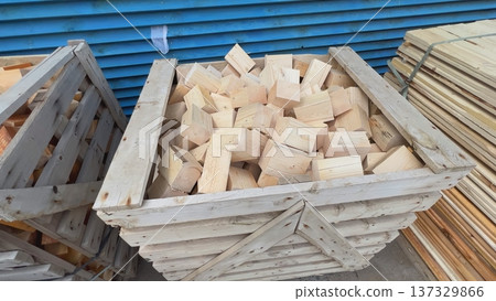 Wooden crate full of small pieces of wood for industrial use 137329866