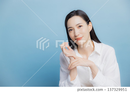 A woman with a white shirt A woman with a white shirt 137329951