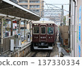 A 6000 series train on the Koyo Line arriving at Shukugawa Station 137330334