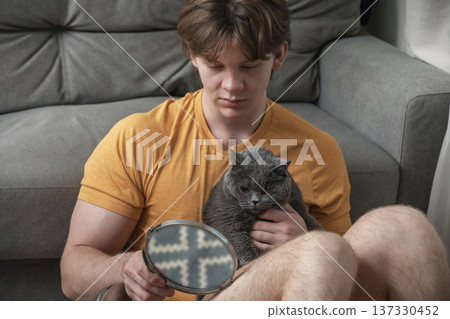 Spending quiet time with pet cat Spending quiet time with pet cat 137330452