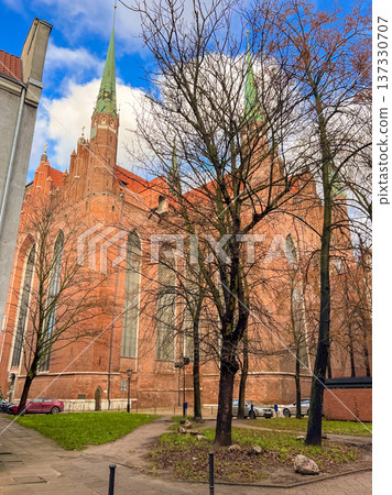 St. Mary's church in Gdansk, Poland stands tall in the urban area on a sunny day 137330707