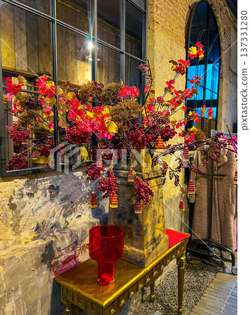 Chinese new year celebration with red and yellow floral indoor decor Chinese new year celebration with red and yellow floral indoor decor 137331280
