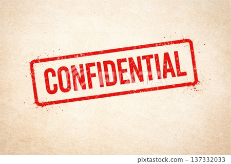 Red confidential stamp on textured paper background for privacy and security concept Red confidential stamp on textured paper background for privacy and security concept 137332033