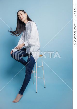 A woman with a white shirt A woman with a white shirt 137332493