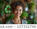 Smiling Woman With Curly Hair And Recycling Symbol 137332746