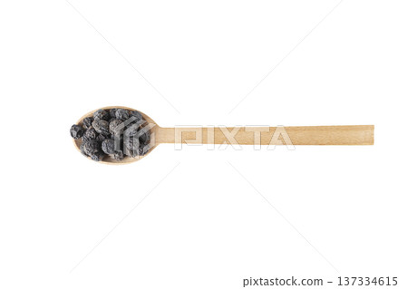 Dried Prunus spinosa, called blackthorn or sloe on wooden spoon isolated on white background. Dried Prunus spinosa, called blackthorn or sloe on wooden spoon isolated on white background. 137334615
